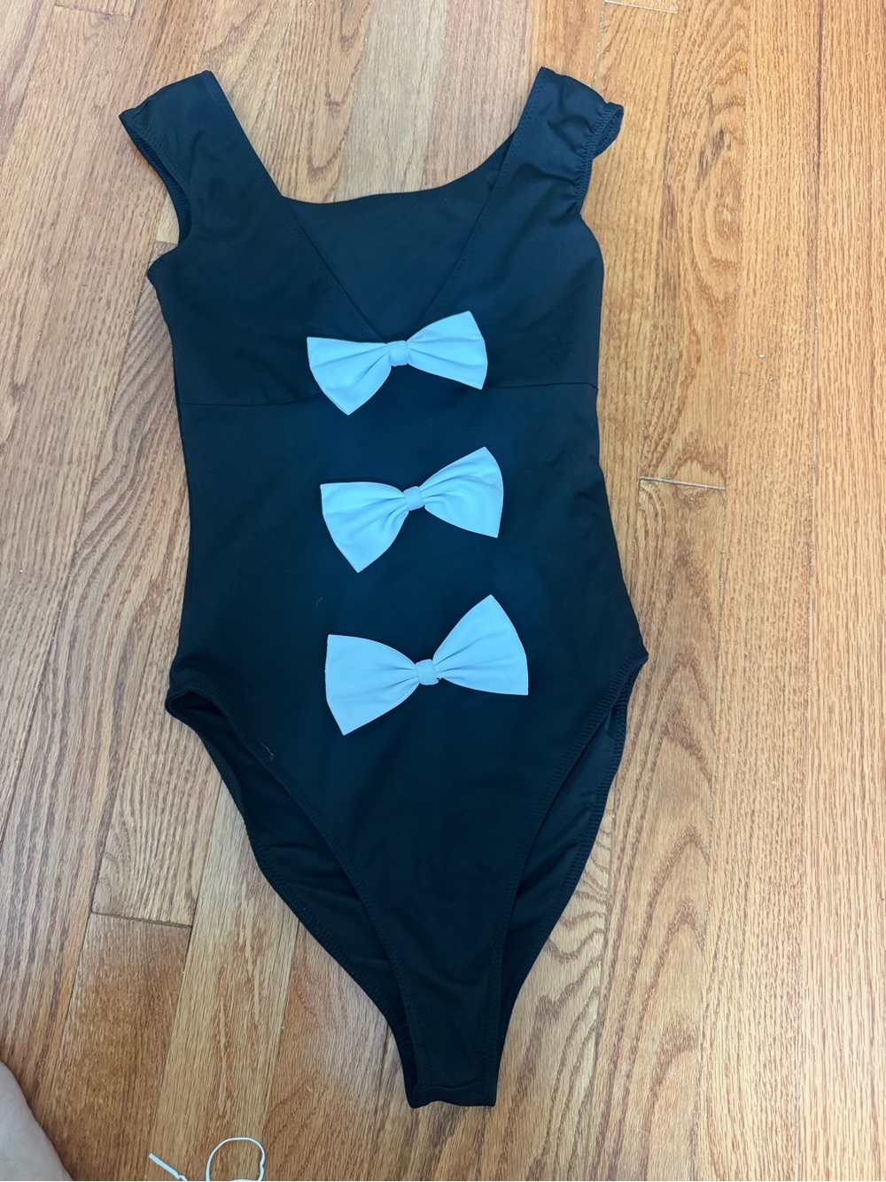 Caroline Constas Black swimsuit with white bows